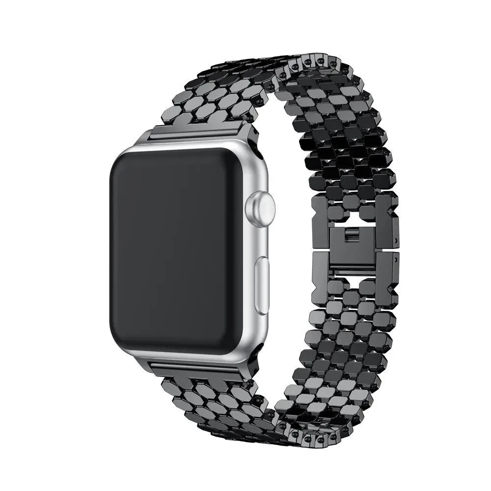 Elegant stainless steel Apple Watch band for women with a polished slim-link design, perfect for formal and casual wear.